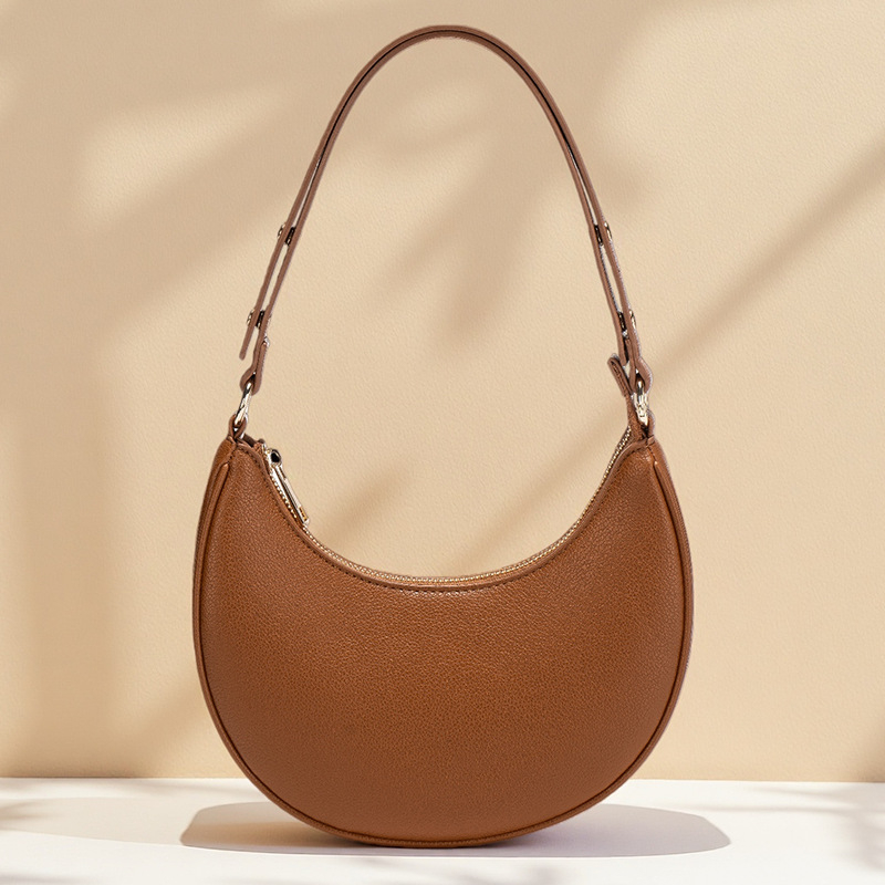 Ženska torba ispod pazuha, ljetna crossbody torba preko ramena, baguette torba u obliku polumjeseca, Instagram inspiracija, model 2026