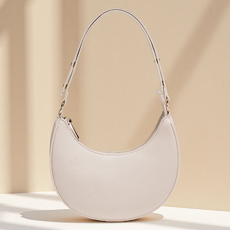 Ženska torba ispod pazuha, ljetna crossbody torba preko ramena, baguette torba u obliku polumjeseca, Instagram inspiracija, model 2026