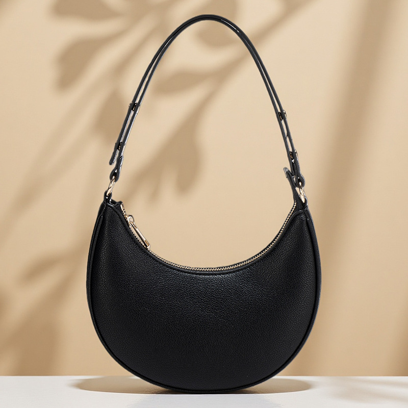 Ženska torba ispod pazuha, ljetna crossbody torba preko ramena, baguette torba u obliku polumjeseca, Instagram inspiracija, model 2026