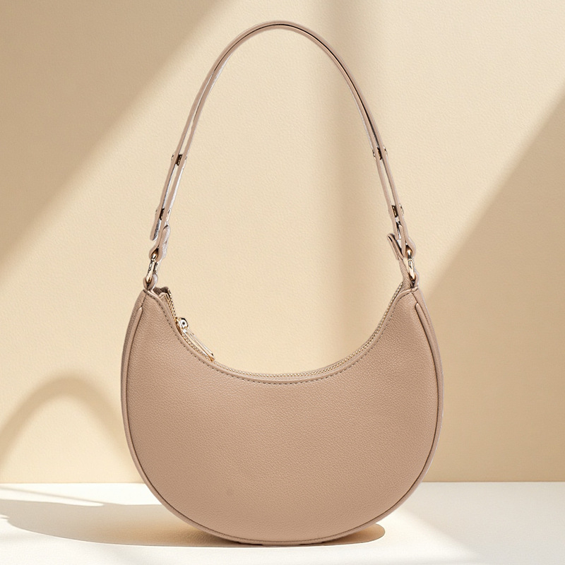 Ženska torba ispod pazuha, ljetna crossbody torba preko ramena, baguette torba u obliku polumjeseca, Instagram inspiracija, model 2026