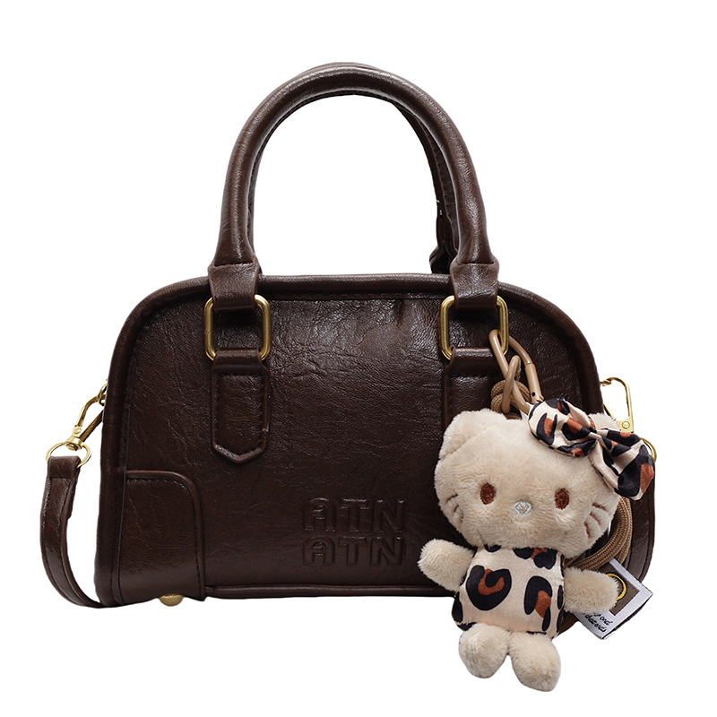 Ženska torba u retro stilu, mini kvadratna PU kožna crossbody torba, proljeće 2026