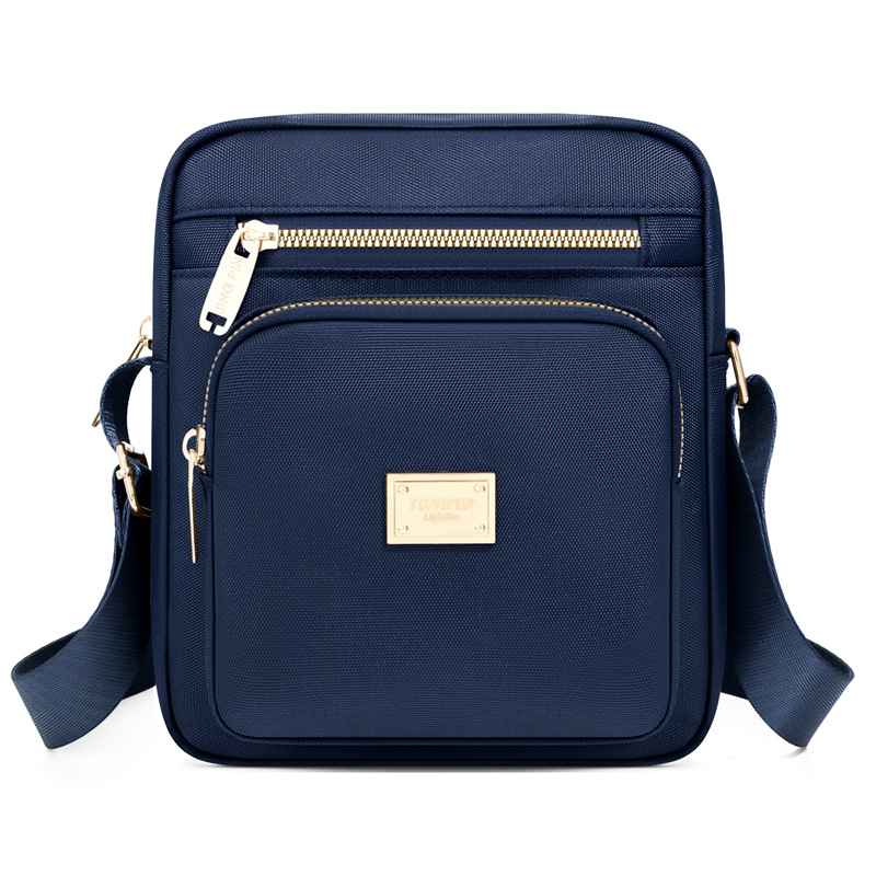 Ženska crossbody torba u gradsko minimalističkom stilu, mala kvadratna torba od Oxford platna sa zatvaračem, unutarnja džep, poliester podstava, Proljeće 2026