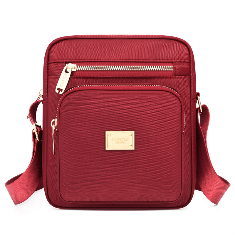 Ženska crossbody torba u gradsko minimalističkom stilu, mala kvadratna torba od Oxford platna sa zatvaračem, unutarnja džep, poliester podstava, Proljeće 2026