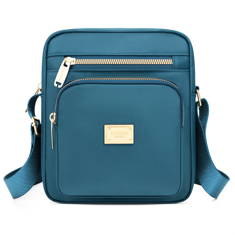 Ženska crossbody torba u gradsko minimalističkom stilu, mala kvadratna torba od Oxford platna sa zatvaračem, unutarnja džep, poliester podstava, Proljeće 2026