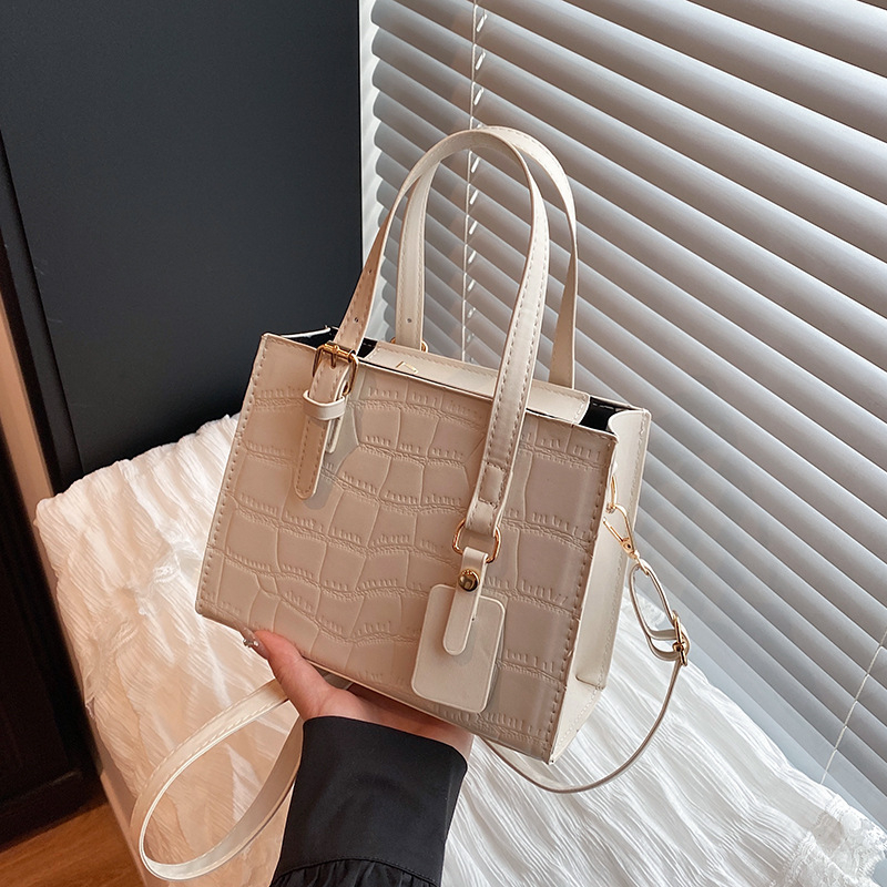 Ženska torbica od prave kože, nišnog stila, novi model 2025, lagani luksuz, crossbody i tote torba