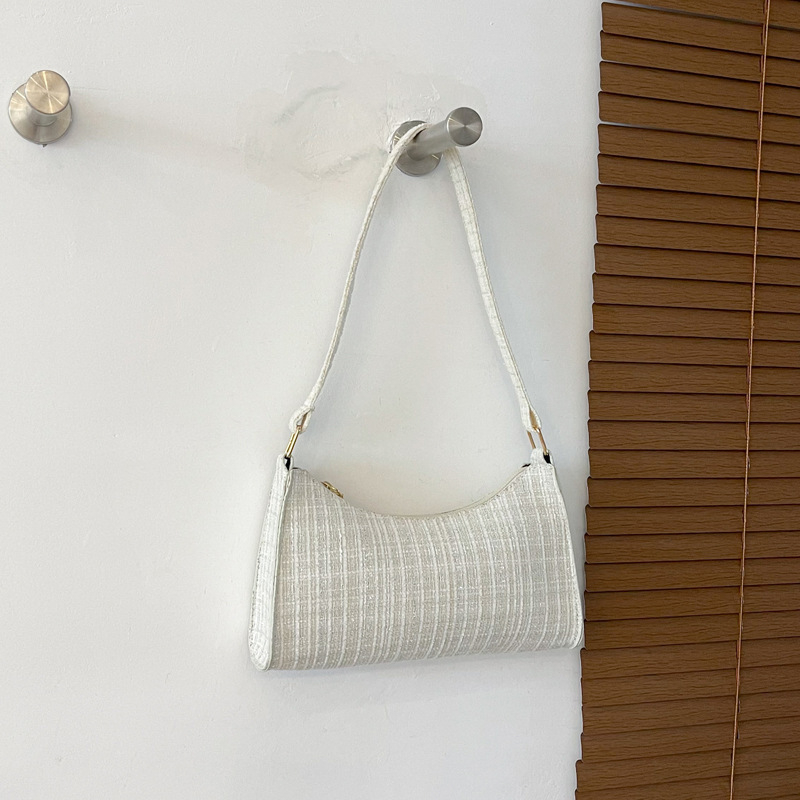 Ženska torbica ispod pazuha s minimalističkim kariranim uzorkom, moderna torba preko ramena, elegantna i svestrana za svakodnevnu uporabu