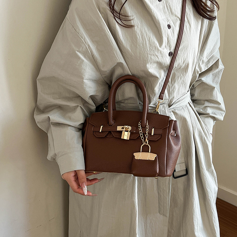 Jednobojna Kelly torba za svakodnevnu upotrebu, svestran gradski stil s jedinstvenim dizajnom