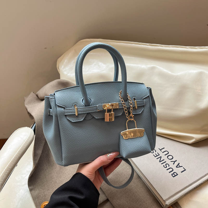 Jednobojna Kelly torba za svakodnevnu upotrebu, svestran gradski stil s jedinstvenim dizajnom