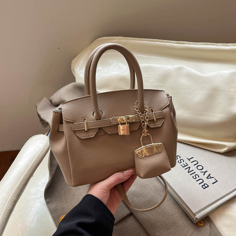Jednobojna Kelly torba za svakodnevnu upotrebu, svestran gradski stil s jedinstvenim dizajnom