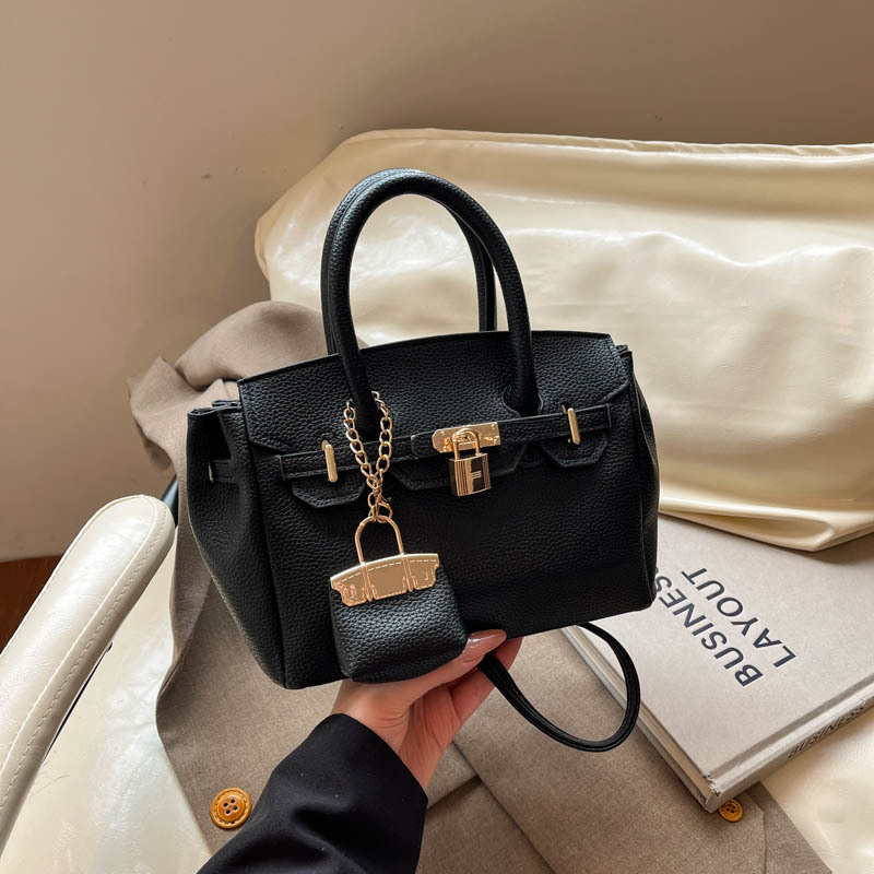 Jednobojna Kelly torba za svakodnevnu upotrebu, svestran gradski stil s jedinstvenim dizajnom