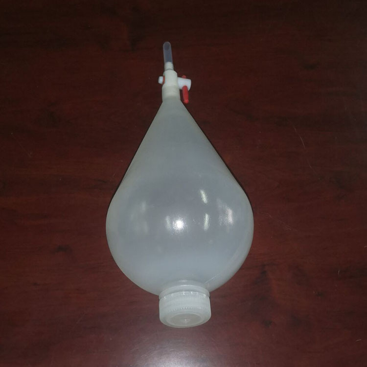 Separator în formă de pară, din PP translucid și sticlă complet transparentă, cu piston și capac din plastic spiral