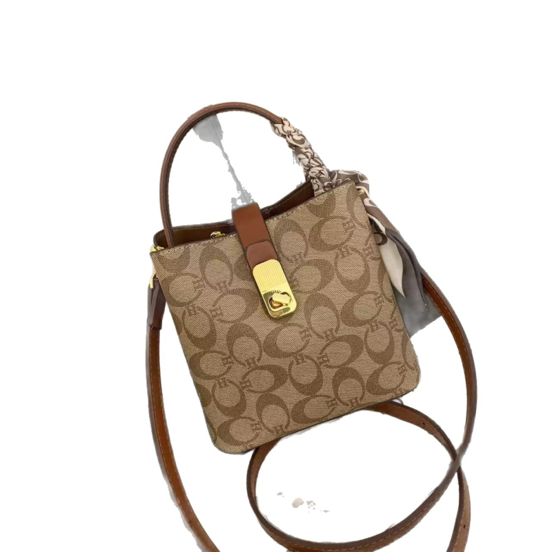 PVC τσάντα bucket, μικρού μεγέθους, crossbody με φουλάρι μονόγραμμα σε color-block σχέδιο, αστικός μινιμαλισμός, άνοιξη 2026