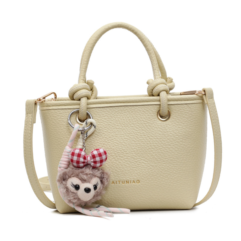 PU bucket torba s lychee uzorkom, mala, pogodna za svakodnevnu upotrebu, s zatvaračem i remenom za rameno ili crossbody.