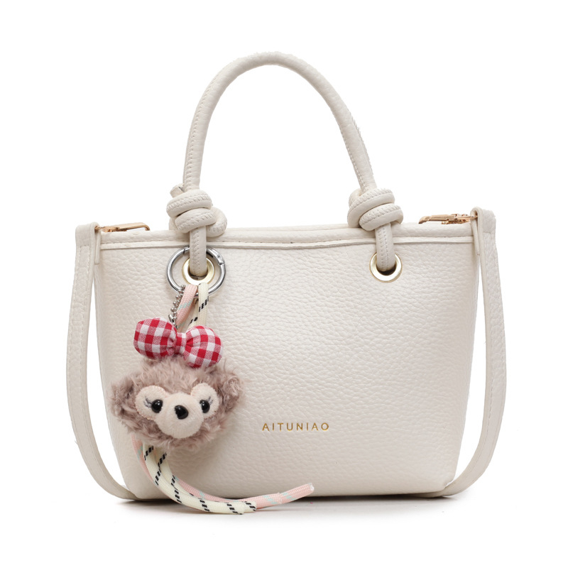 PU bucket torba s lychee uzorkom, mala, pogodna za svakodnevnu upotrebu, s zatvaračem i remenom za rameno ili crossbody.