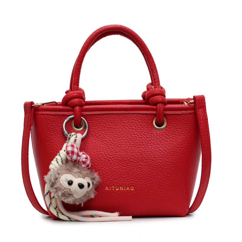 PU bucket torba s lychee uzorkom, mala, pogodna za svakodnevnu upotrebu, s zatvaračem i remenom za rameno ili crossbody.