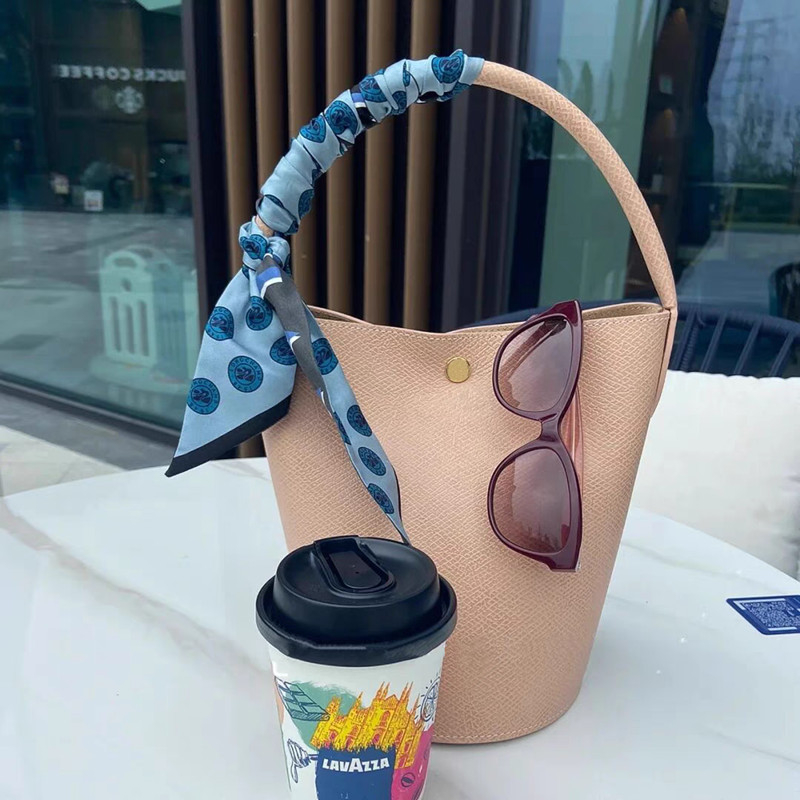 Mini kožna bucket torba, modni model za proljeće-ljeto, preko ramena ili u ruci, ženska casual torba