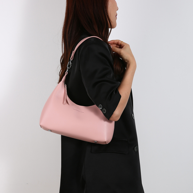 Ženska PU torbica, srednje veličine, ovalnog oblika, dvostruke naramenice, preko ramena i crossbody, zatvarač, gradski stil, ljeto 2024