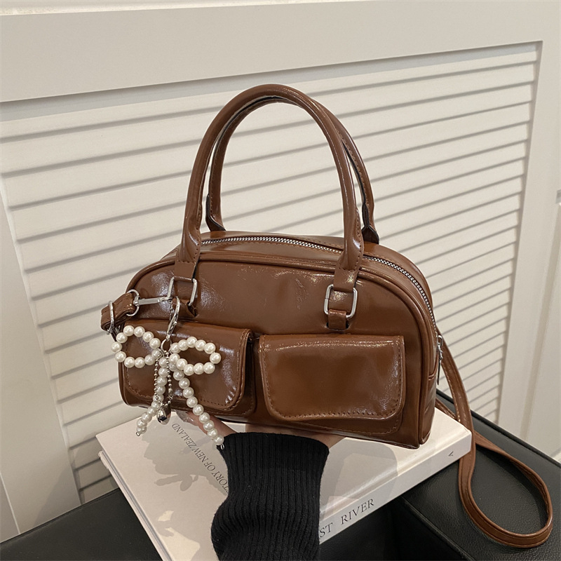 Ženska torba Boston u korejskom stilu, lagani luksuz, srednje veličine, torba za rame i crossbody, model 2025