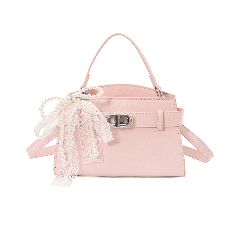 Ženska Kelly torbica s nišnim dizajnom, lagani luksuz, novi model 2026, visoka kvaliteta, pogodna za rame ili crossbody.