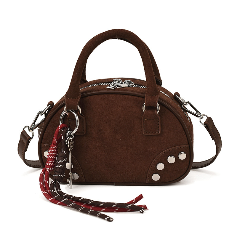 2025 nova ženska torba za jesen-zimu, visoke kvalitete, korejskog dizajna boutique, s ukrasnim čavlima, za nošenje preko ramena i crossbody