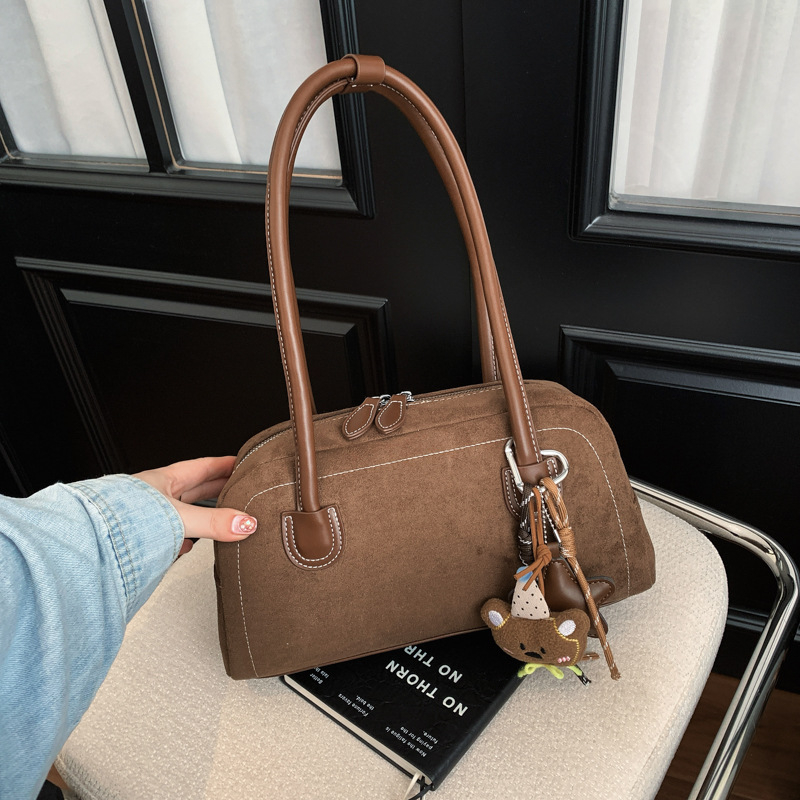 Ženska crossbody torba od brušene kože, jesen-zima retro stil baguette oblik, novi model 2025