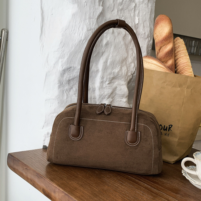 Ženska crossbody torba od brušene kože, jesen-zima retro stil baguette oblik, novi model 2025