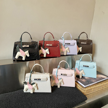 Visokokvalitetna ženska Kelly torba, 2026 novi model, tekstura kamena, torba za ramena ili crossbody, moderan i svestran stil