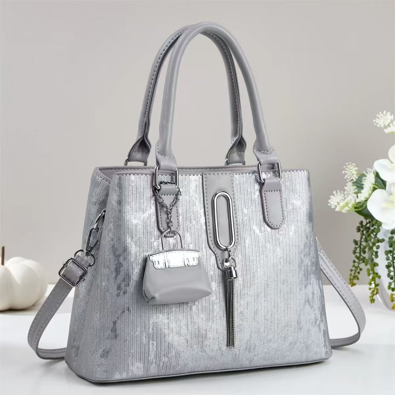 2025 nova ženska torba s resicama, elegantna tekstura, za nošenje preko ramena i crossbody, jednostavan dnevni stil