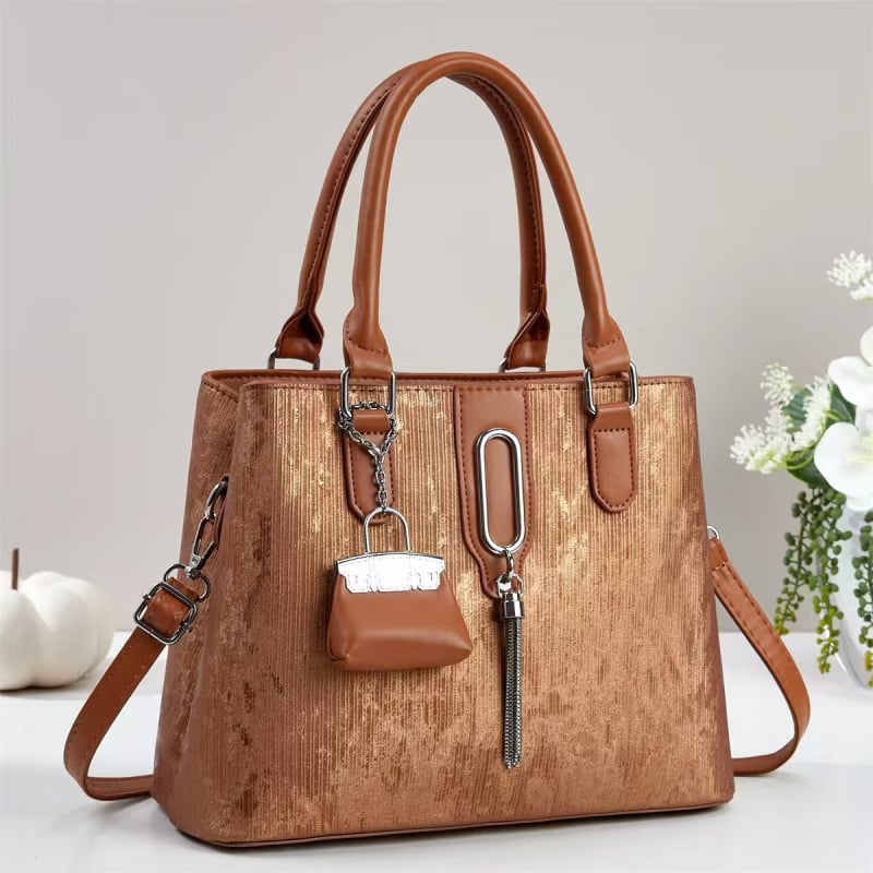 2025 nova ženska torba s resicama, elegantna tekstura, za nošenje preko ramena i crossbody, jednostavan dnevni stil