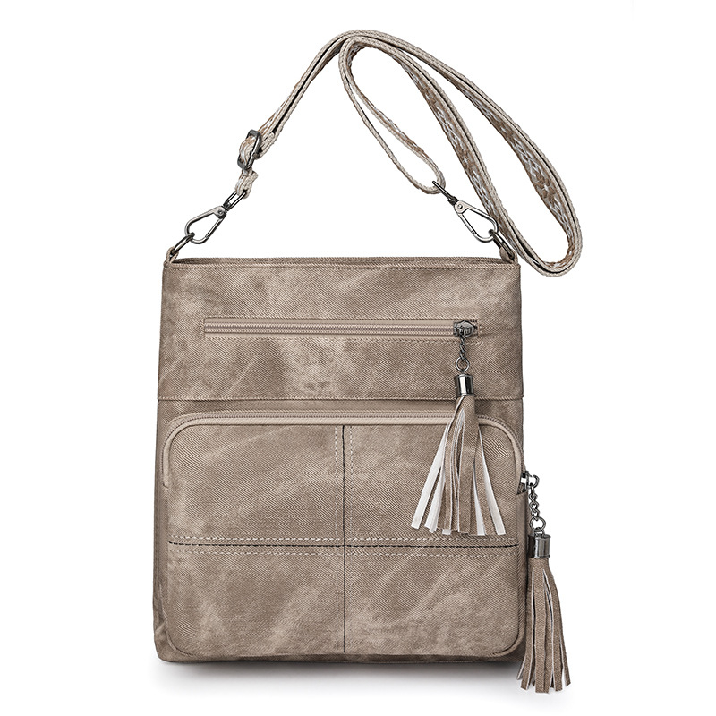 Ženska torbica za telefon s višestrukim džepovima, uspravni dizajn, crossbody naramenica, dodatak s resicama, minimalistički stil