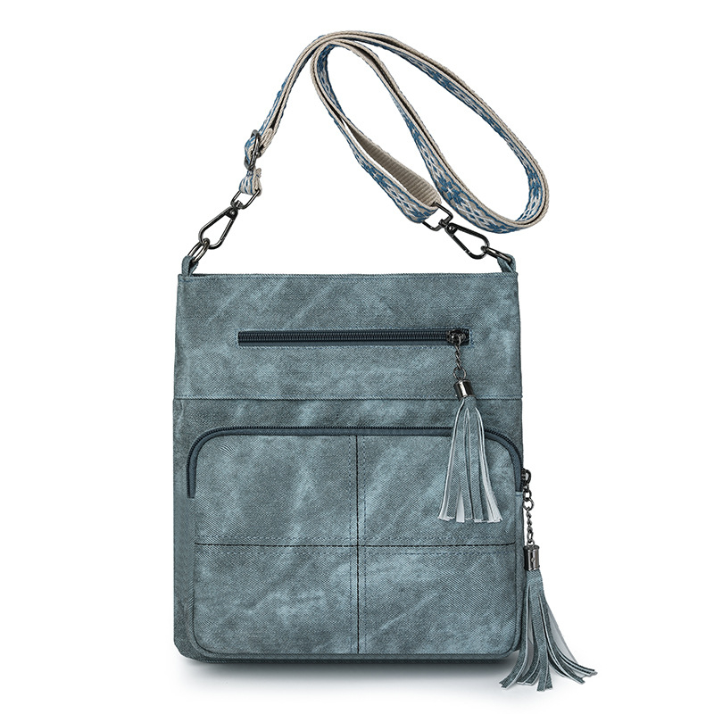Ženska torbica za telefon s višestrukim džepovima, uspravni dizajn, crossbody naramenica, dodatak s resicama, minimalistički stil