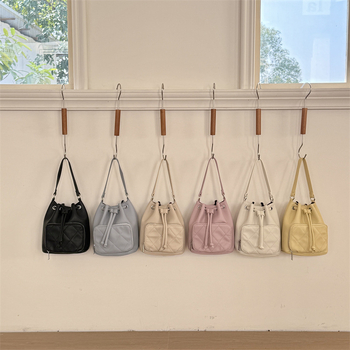 Ženska teksturirana mini bucket torbica od PU kože, kvilting uzorak, 2026 nova moda za svakodnevno nošenje, torba za ručno nošenje i crossbody
