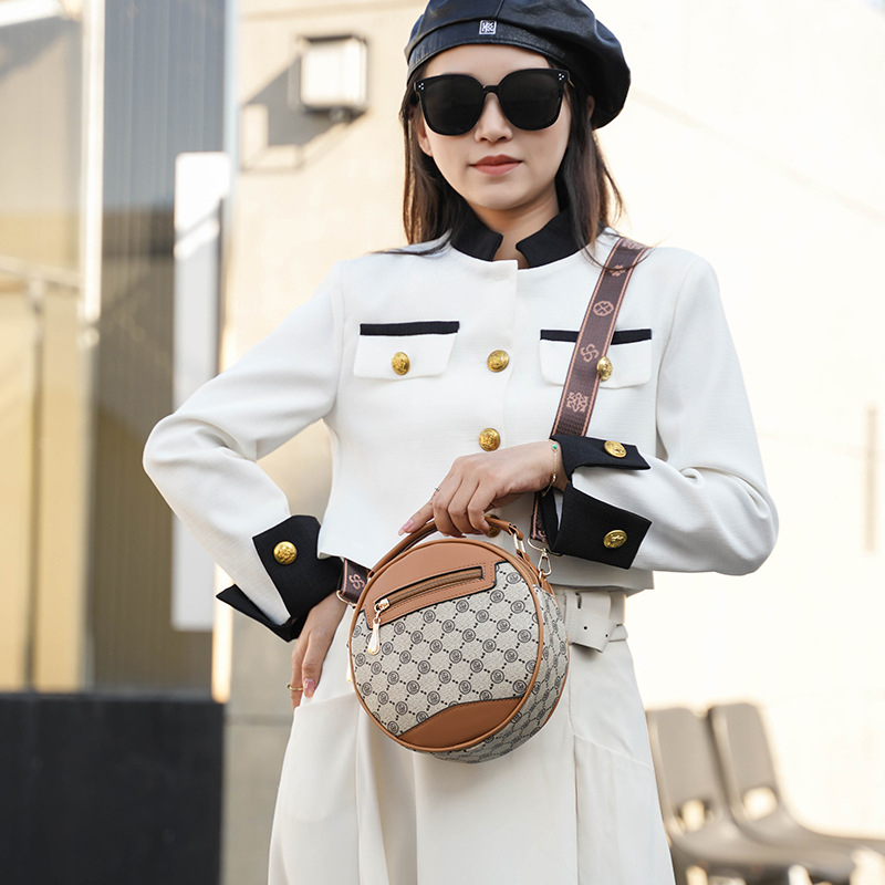 Mini okrugla torbica u korejskom stilu, PVC, bucket bag, ženska torba za ljeto 2026