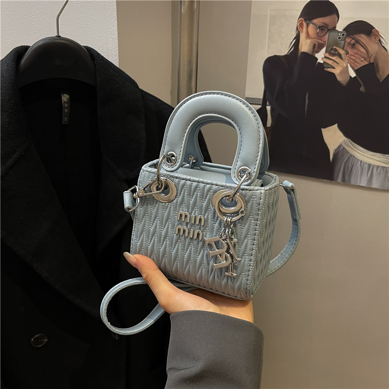 Mala ženska torbica s plisiranim dizajnom, preko ramena ili crossbody