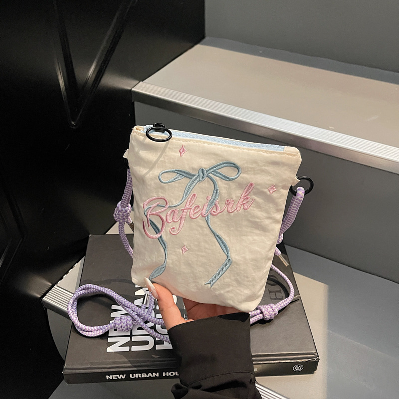 Ljetna ženska crossbody torbica s mašnicom, lagana i svestrana, platnena torbica preko ramena, sa zatvaračem i malim džepom za novac