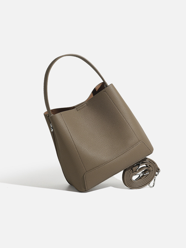 Elegantna ženska bucket torba od mekane kože, velika kapaciteta, model 2025, svestrana za nošenje: u ruci, na ramenu ili preko tijela.