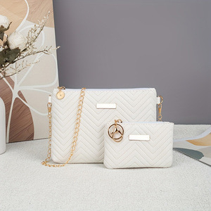 Set od dvije ženske torbe s valovitim uzorkom, jednobojna, reljefna tekstura, crossbody torba