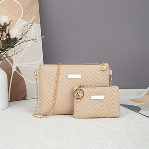 Set od dvije ženske torbe s valovitim uzorkom, jednobojna, reljefna tekstura, crossbody torba