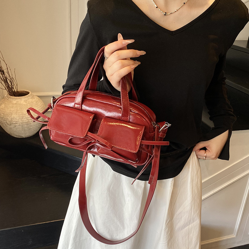 Korejski stil, mala kvadratna crossbody torba za žene s mašnicom, proljeće 2026, PU koža