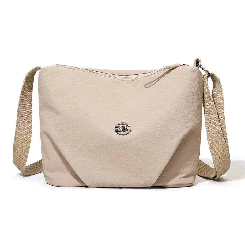 Torba crossbody srednje veličine, velika kapaciteta, vodootporna tkanina, gradski minimalistički stil, zatvaranje na zip, podstava od poliestera