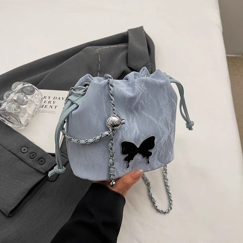 Ženska mini torbica s lancem, 2024 proljeće-ljeto, nišni dizajn, crossbody torba tip košare sa šnonom