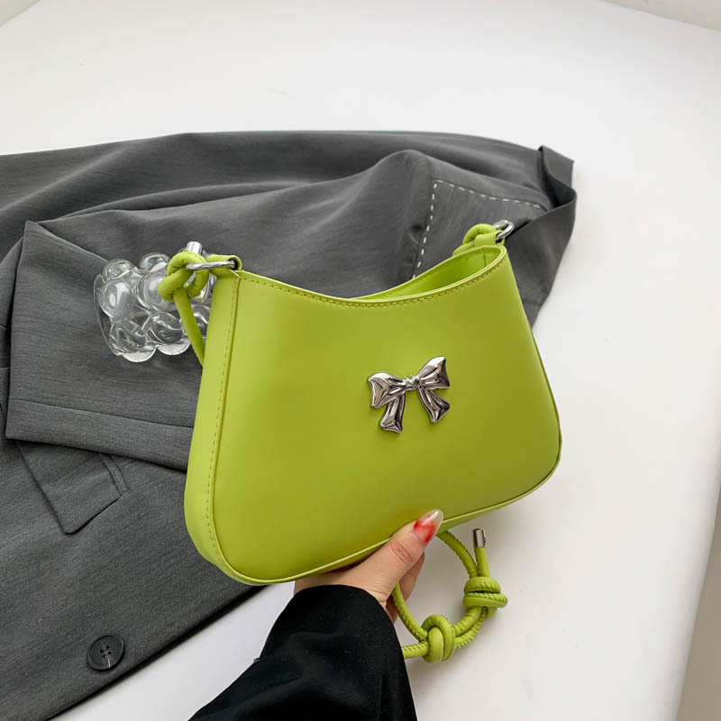 Ženska torbica s mašnicom u obliku polumjeseca, preko ramena i crossbody, dojam vrhunske kvalitete, nišni model