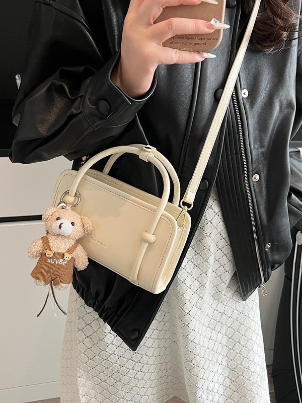 Moderna ženska mala torbica za proljeće-ljeto 2025, minimalistički dizajn, preko ramena ili crossbody, kvadratnog oblika