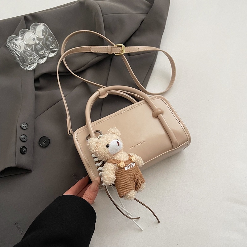 Moderna ženska mala torbica za proljeće-ljeto 2025, minimalistički dizajn, preko ramena ili crossbody, kvadratnog oblika