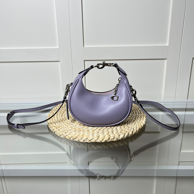 Ženska mini torbica s retro polumjesecom, crossbody, od prave kože.