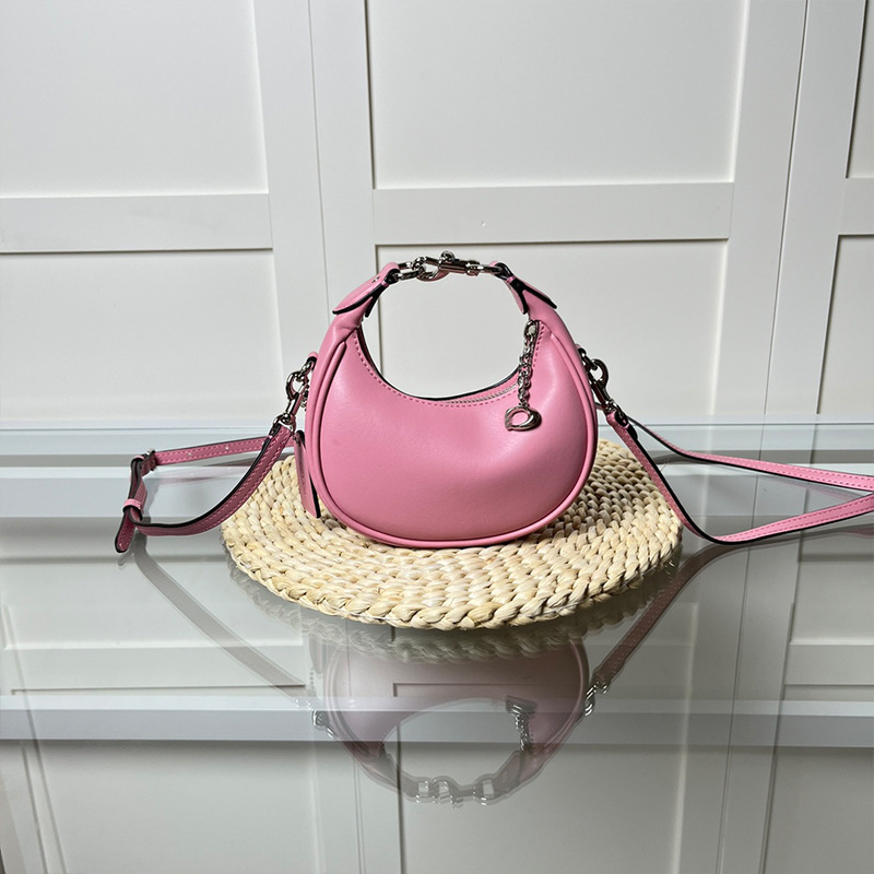Ženska mini torbica s retro polumjesecom, crossbody, od prave kože.