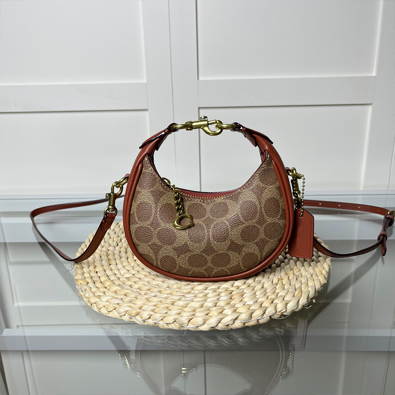 Ženska mini torbica s retro polumjesecom, crossbody, od prave kože.
