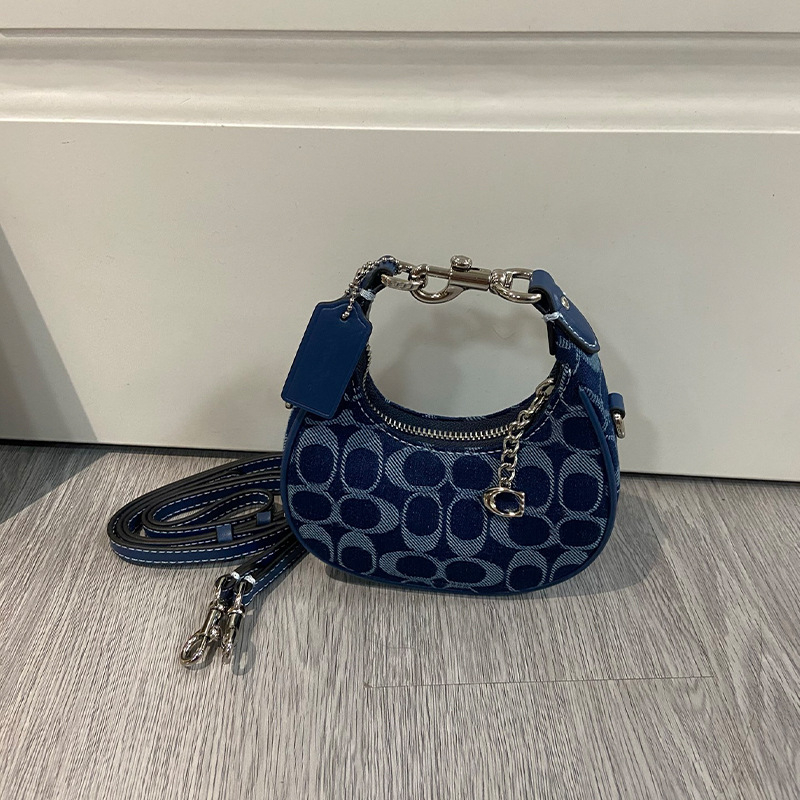 Ženska mini torbica s retro polumjesecom, crossbody, od prave kože.