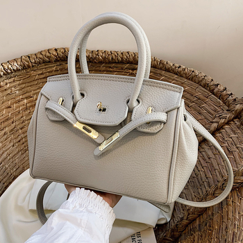 Ženska torbica od PU kože, može se nositi preko ramena ili kao crossbody, srednje veličine, platinski završetak, gradski minimalistički stil, 2025