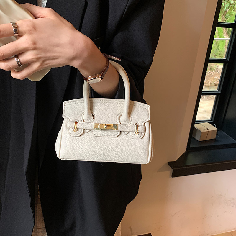 Ženska torbica od PU kože, može se nositi preko ramena ili kao crossbody, srednje veličine, platinski završetak, gradski minimalistički stil, 2025